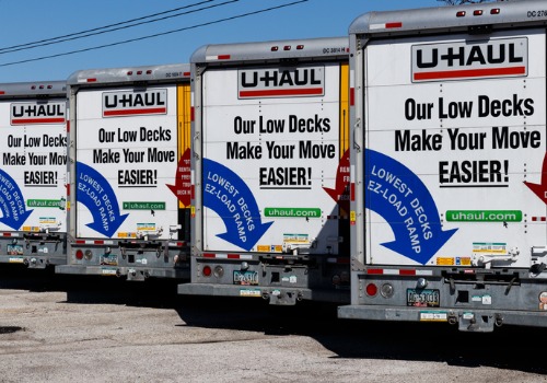 A row of moving trucks, part of Curt's U-Haul Service in Peoria IL