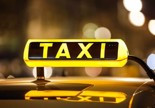 An illuminated taxi sign in Peoria IL